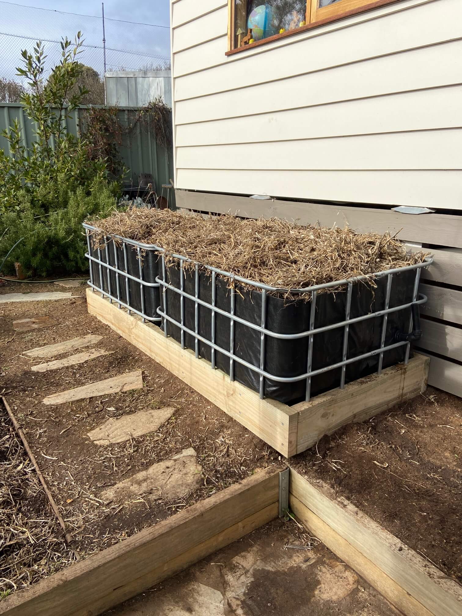 Farmer Phil IBC vegetable wicking beds near the patio